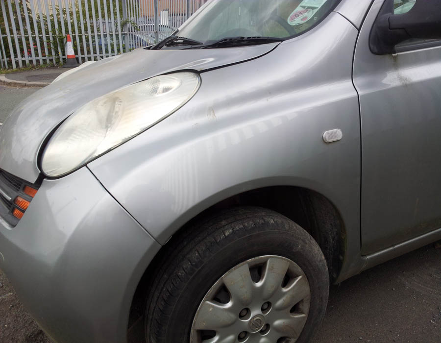 Nissan Micra E wing-passenger-side-front